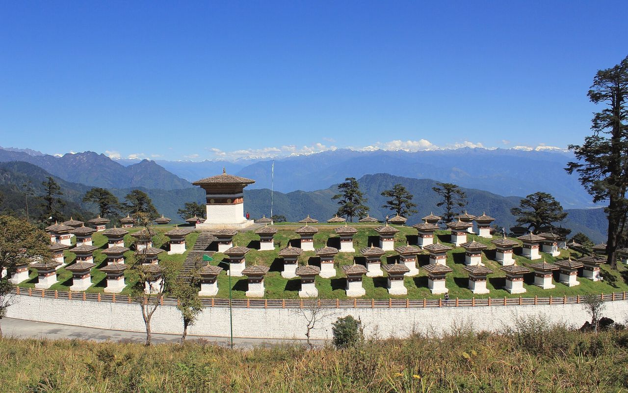 The 108 white chortens of Dochula on their hillock.